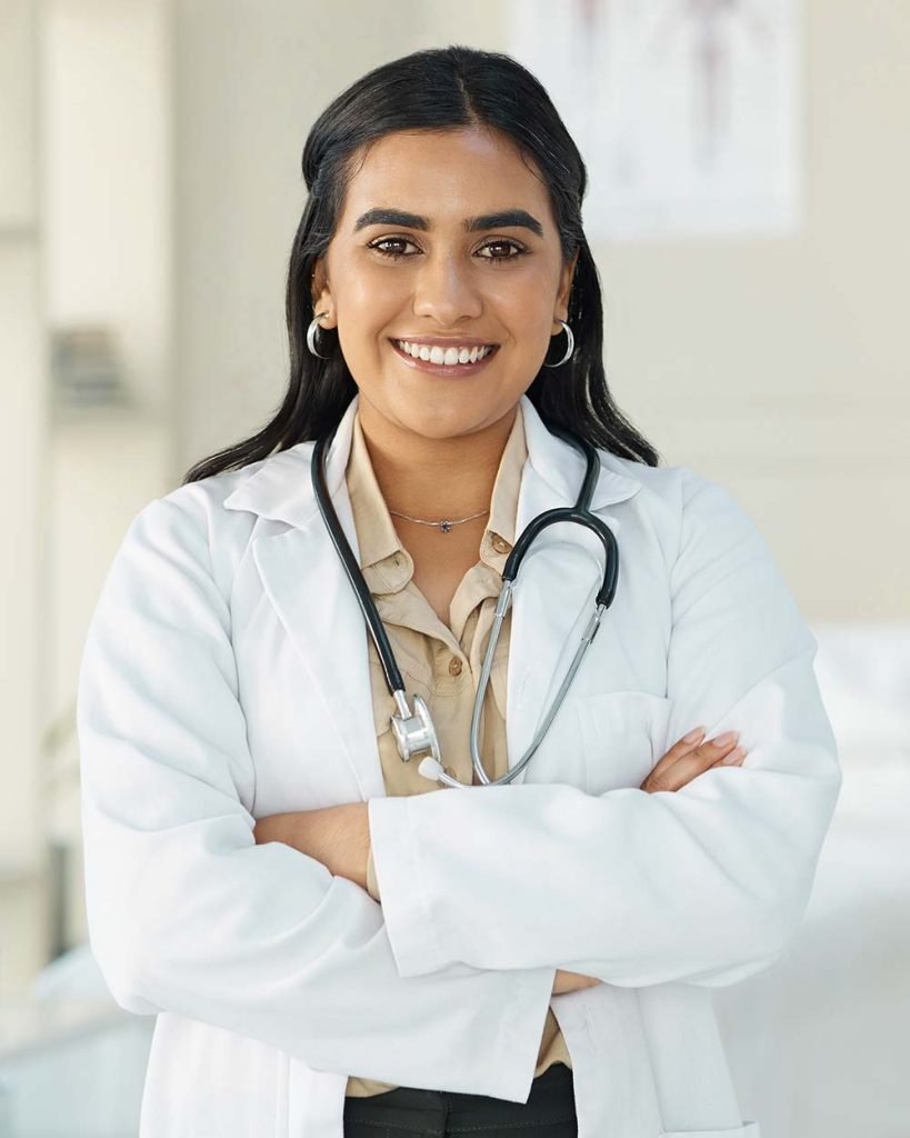 shot-of-an-attractive-young-doctor-standing-alone-BXN6UZD-819x1024